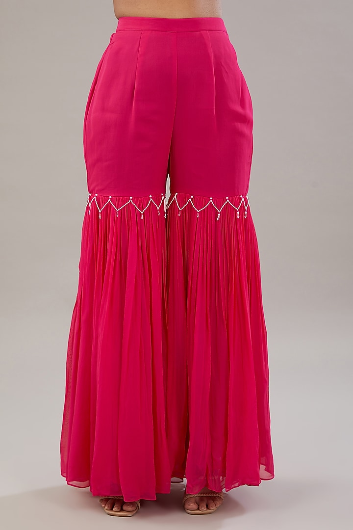 Fuchsia Pink Georgette Bead & Resham Embroidered Gharara Set by NITISHA KASHYAP at Pernia's Pop Up Shop