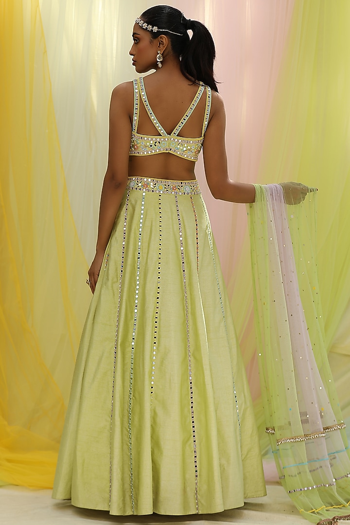Green Soft Net & Raw Silk Embroidered Wedding Lehenga Set by Nikita at Pernia's Pop Up Shop