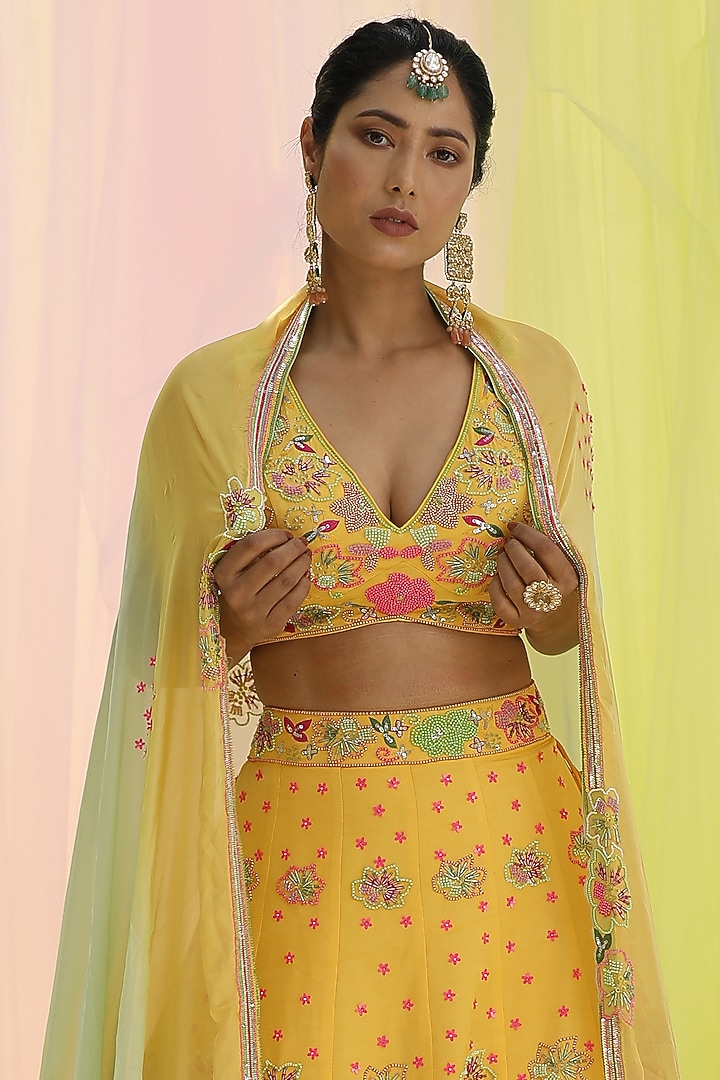 Yellow Raw Silk & Georgette Embroidered Wedding Lehenga Set by Nikita at Pernia's Pop Up Shop