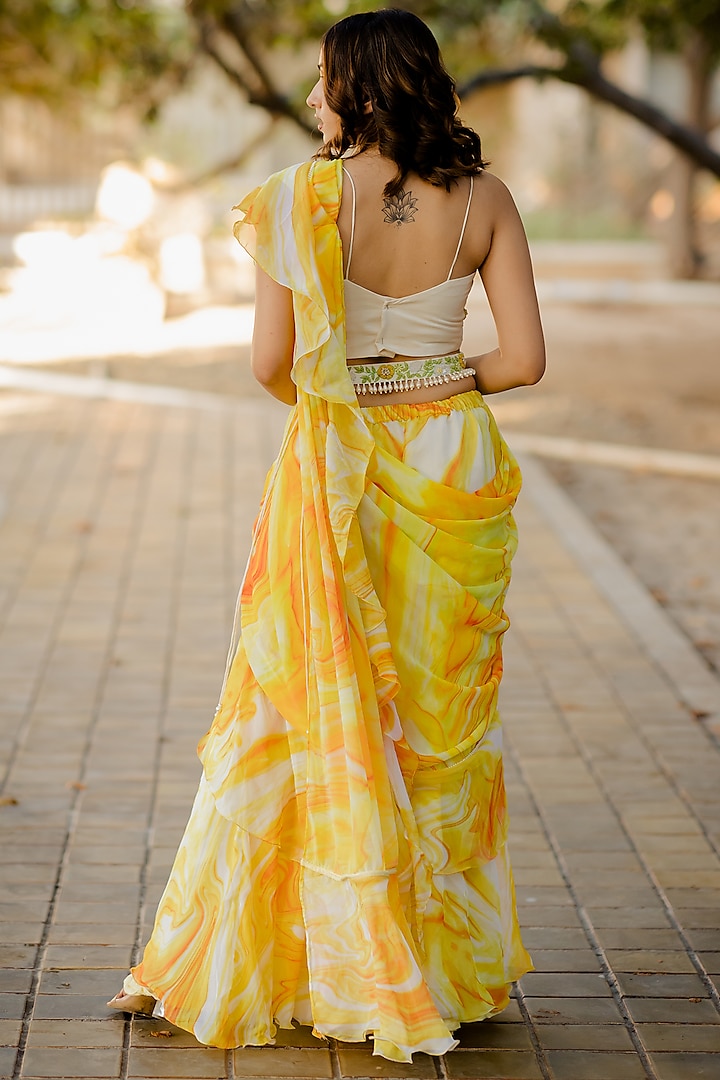 Yellow Ruffled Moti Embellished Wedding Saree Set by Nikita Vishakha at Pernia's Pop Up Shop