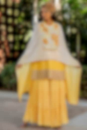 Yellow Raw Silk Flared Sharara Set by Nikita Vishakha at Pernia's Pop Up Shop