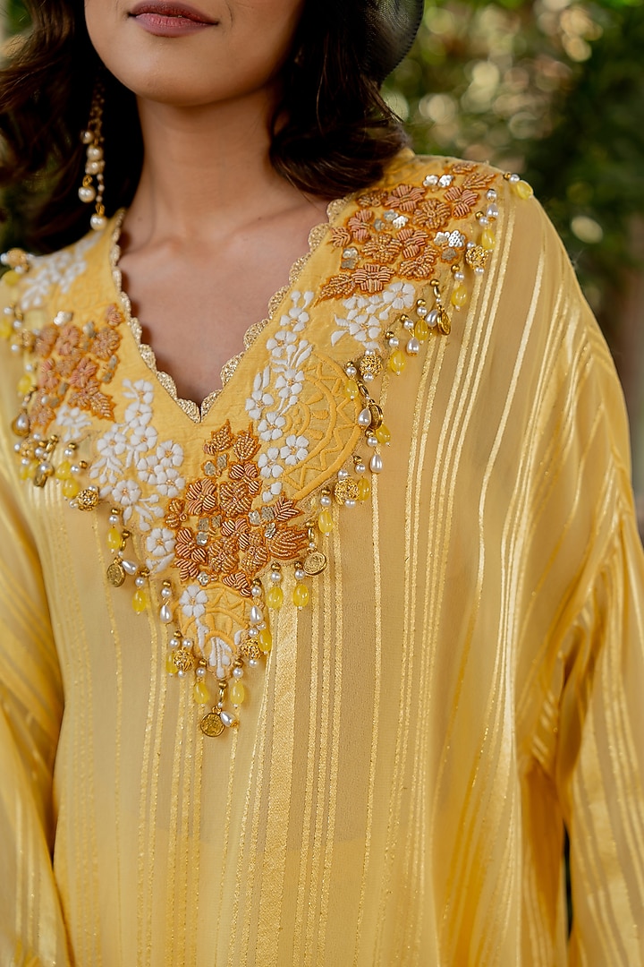 Yellow Lurex Pleated Skirt Set by Nikita Vishakha at Pernia's Pop Up Shop