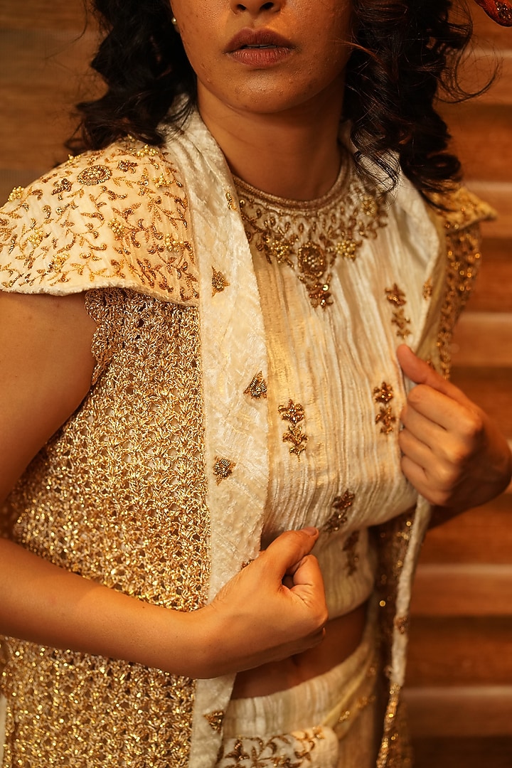 Pearl White Hand Embroidered Jacket Wedding Lehenga Set by Nikita Vishakha at Pernia's Pop Up Shop