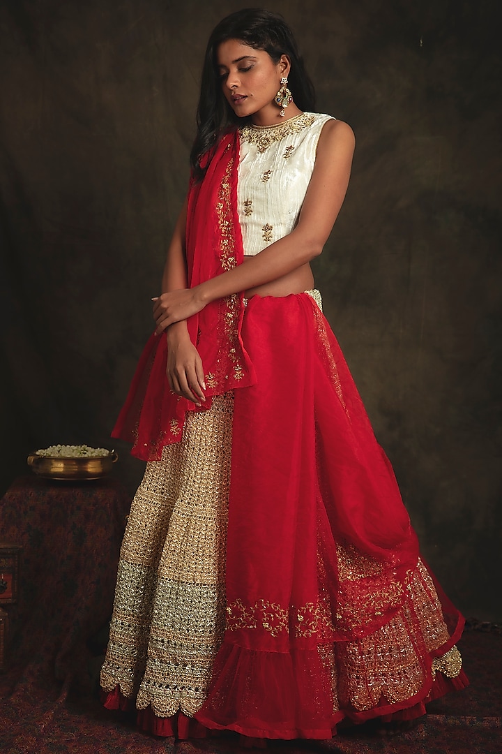 Pearl White & Auspicious Red Mesh Wedding Lehenga Set by Nikita Vishakha at Pernia's Pop Up Shop