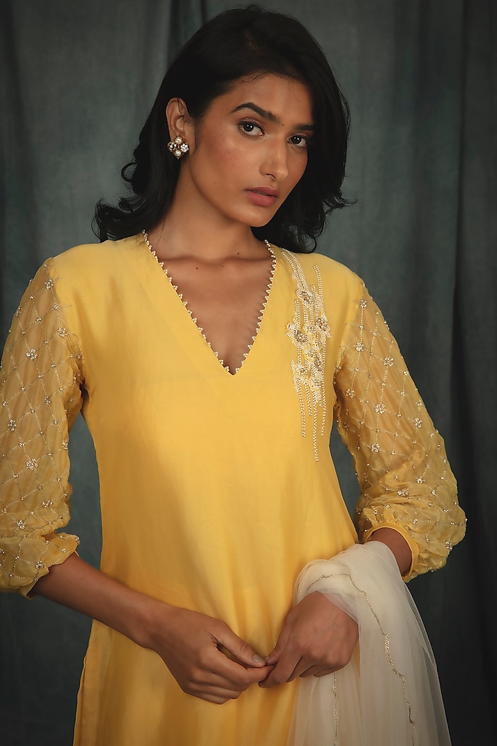 Primrose Yellow Mesh Wedding Sharara Set by Nikita Vishakha at Pernia's Pop Up Shop