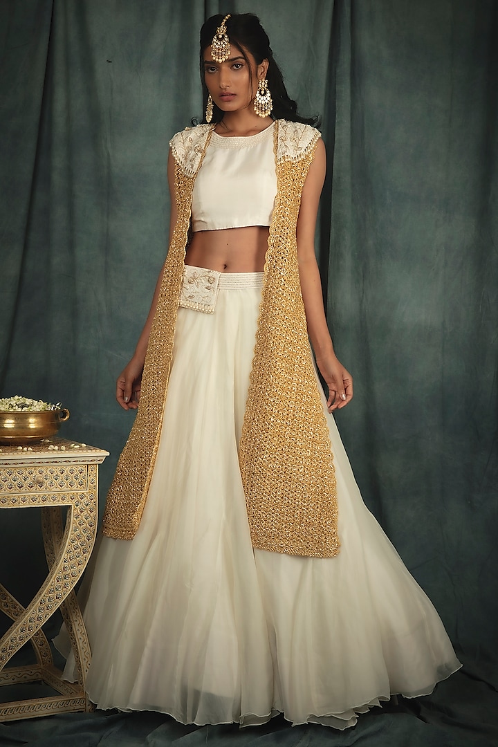 Ivory Organza Wedding Lehenga Set by Nikita Vishakha at Pernia's Pop Up Shop
