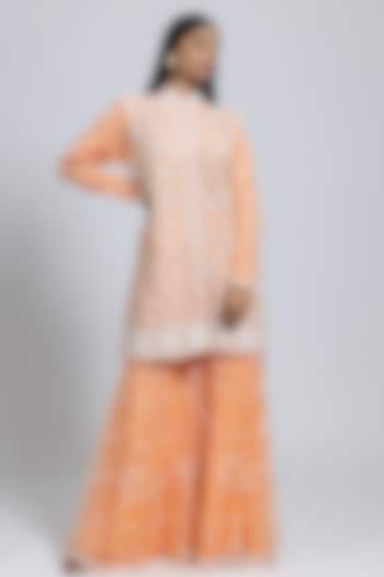 Peach Net Moti & Cutdana Hand Embellished Flared Sharara Set by NIMA FASHIONS