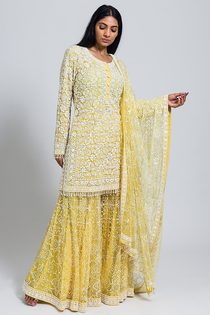 Yellow Net Moti & Cutdana Hand Embellished Flared Sharara Set by NIMA FASHIONS