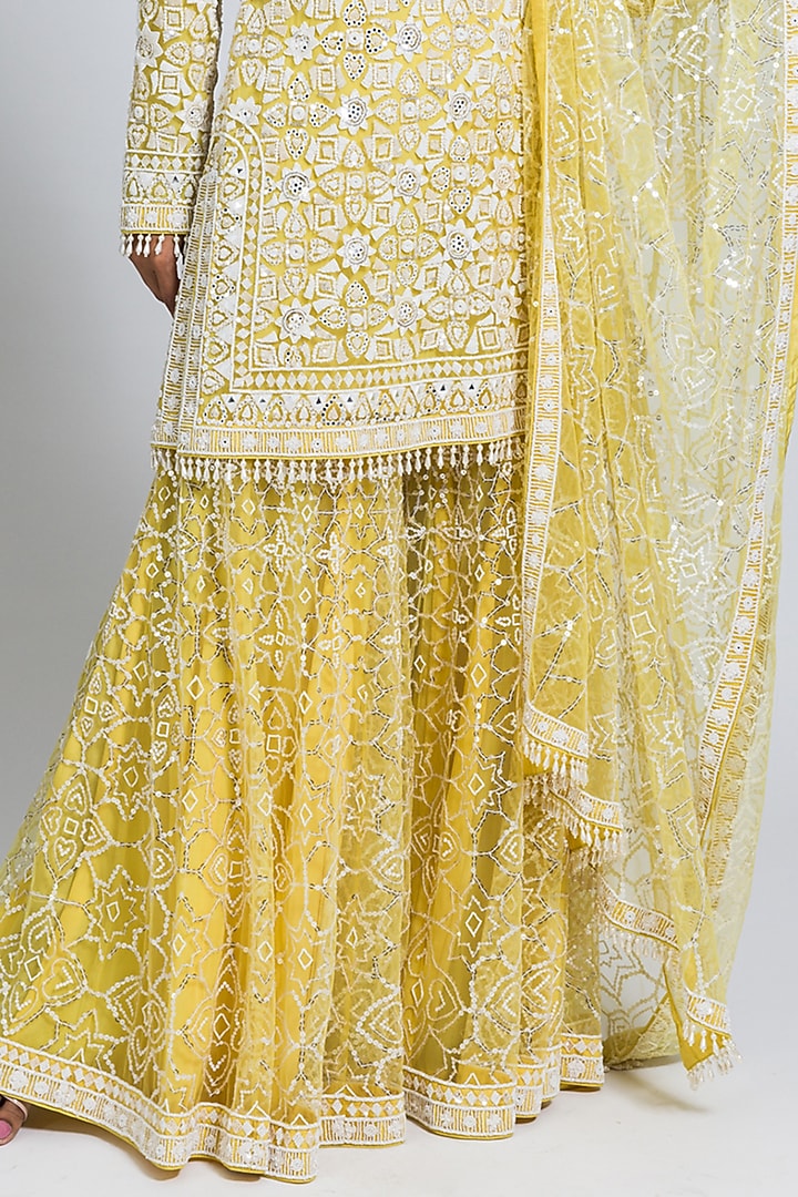 Yellow Net Moti & Cutdana Hand Embellished Flared Bridal Sharara Set by NIMA FASHIONS at Pernia's Pop Up Shop