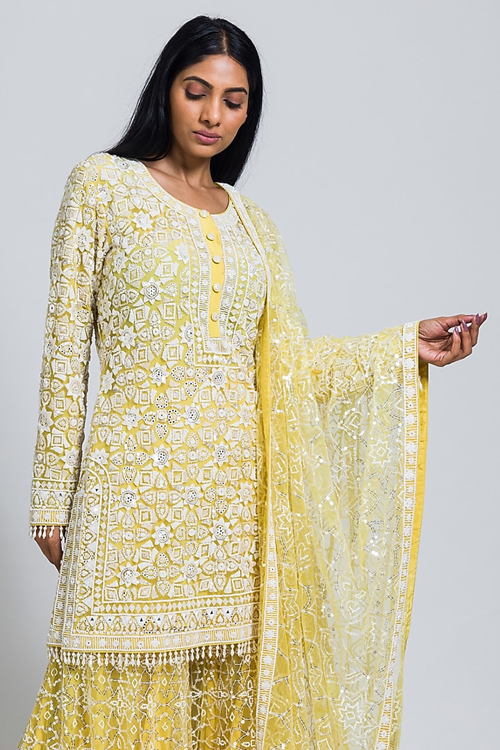 Yellow Net Moti & Cutdana Hand Embellished Flared Bridal Sharara Set by NIMA FASHIONS at Pernia's Pop Up Shop