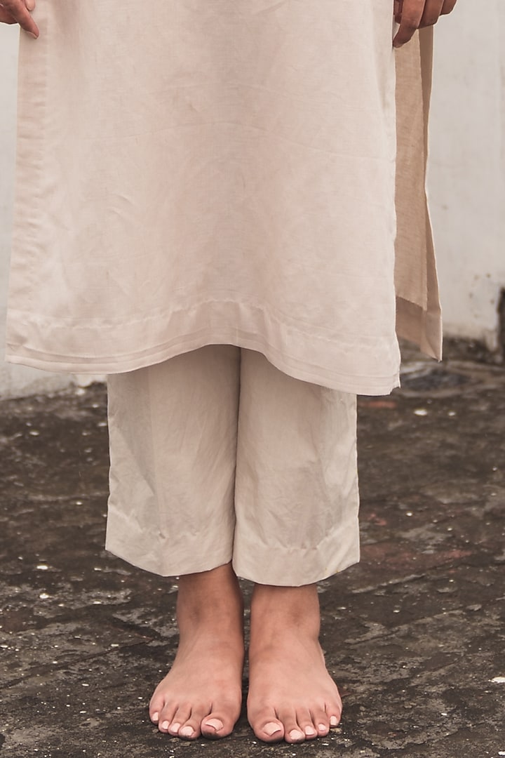 Beige Linen Embroidered Kurta Set by Nineh at Pernia's Pop Up Shop