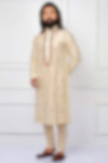Butter Cream Embroidered Kashmiri Kurta Set by Nitesh Singh Chauhan at Pernia's Pop Up Shop