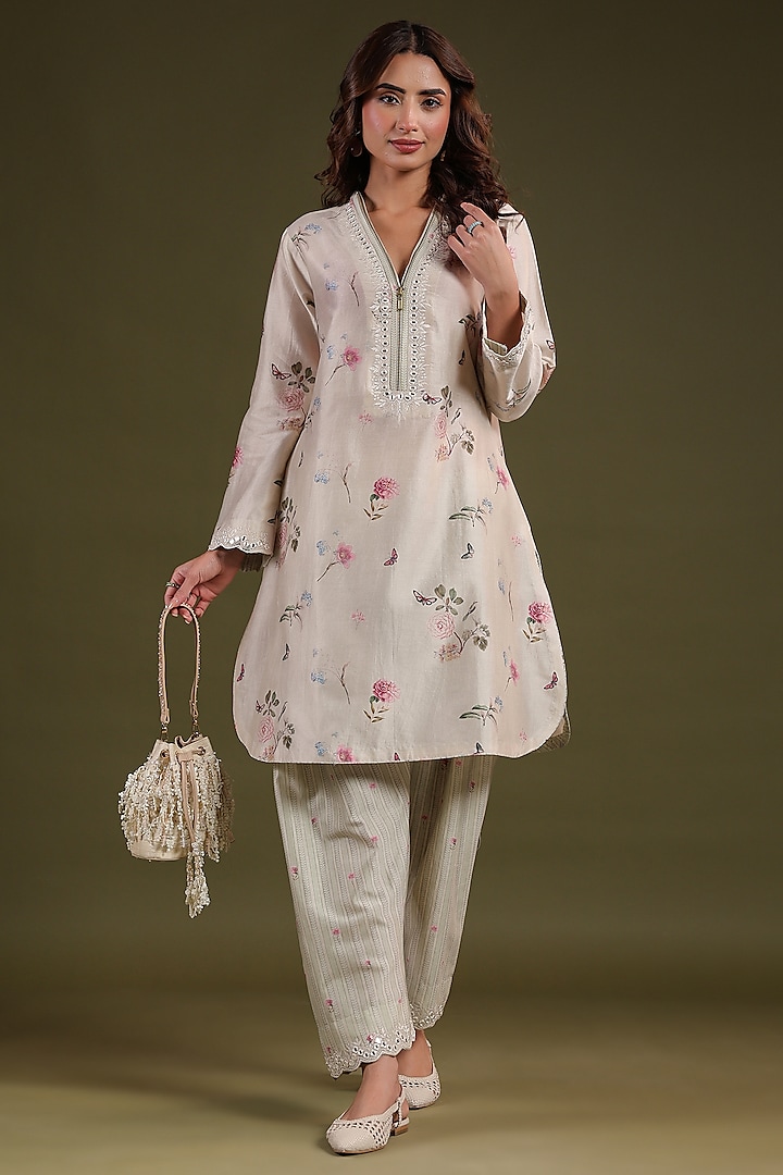 Ivory Silk Chanderi Printed & Mirror Embroidered Short Kurta Set by Niti Bothra at Pernia's Pop Up Shop
