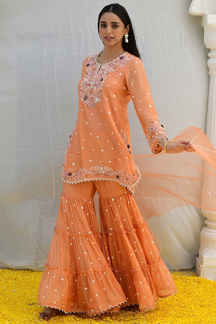 Peach Banarasi Silk Embroidered Tiered Sharara Set by Niti Bothra at Pernia's Pop Up Shop