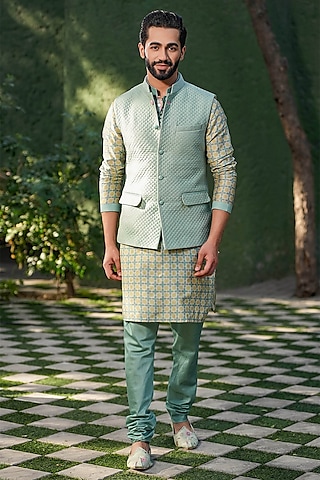 Turquoise Fine Silk Chanderi Quilted Bundi Jacket by Niti Bothra Men