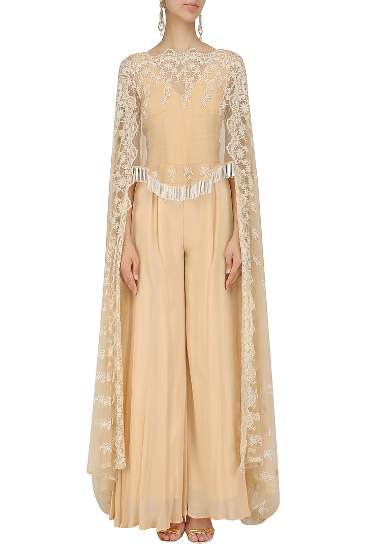 Beige jumpsuit and tulle cape set available only at Pernia's Pop Up Shop.