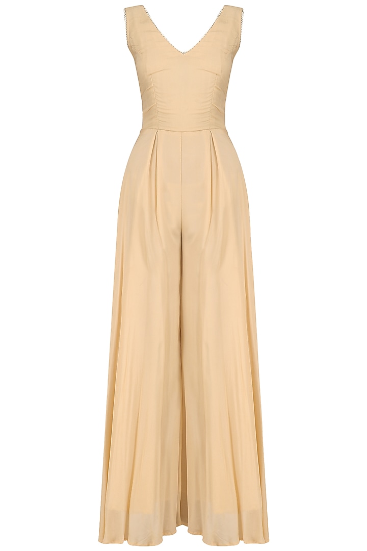 Beige jumpsuit and tulle cape set available only at Pernia's Pop Up Shop.