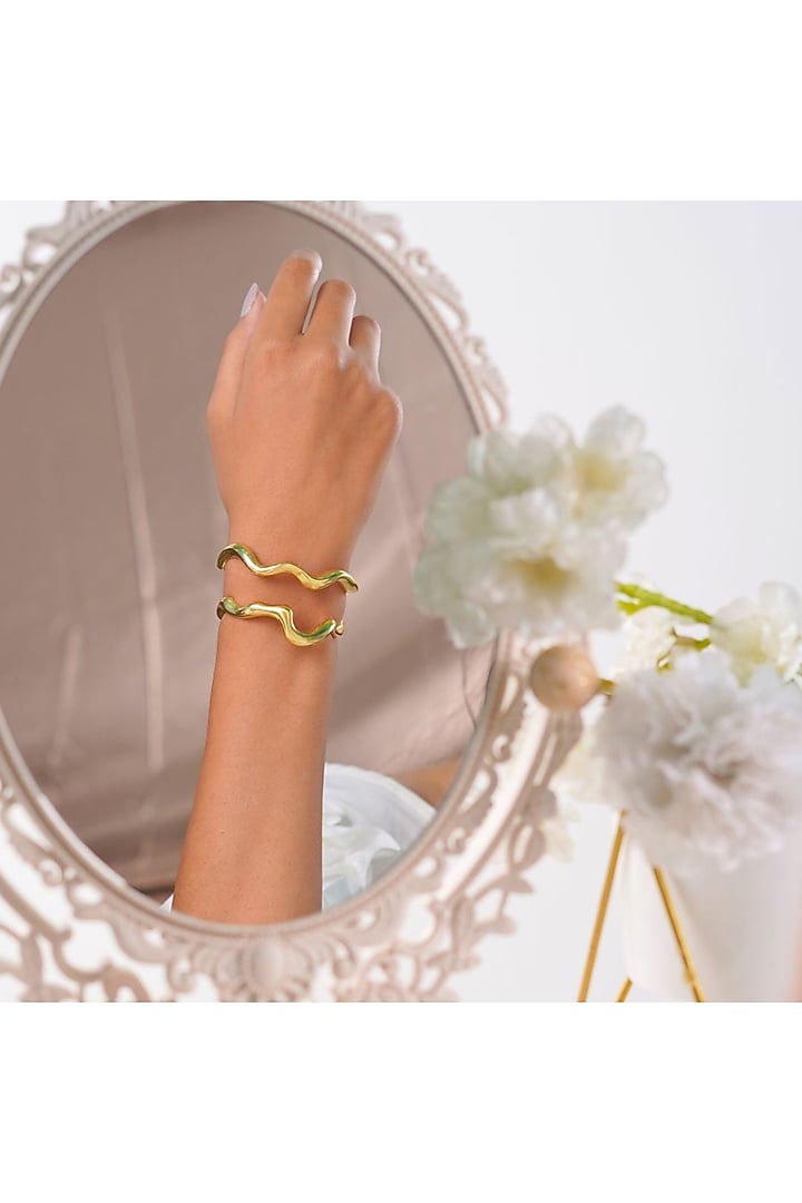 Gold Finish Handcrafted Ripple Handcuff by NIHIRAA INDIA at Pernia's Pop Up Shop