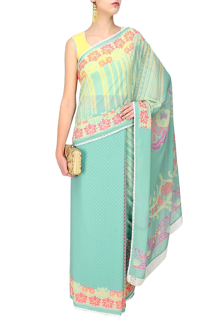 Turquoise blue printed saree available only at Pernia's Pop Up Shop.
