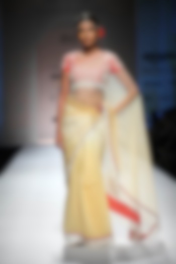 Ivory and mango shaded badla saree with red zardozi blouse available only at Pernia's Pop Up Shop.