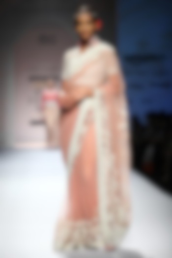 Rose color thread and zardozi work saree with crochet blouse available only at Pernia's Pop Up Shop.