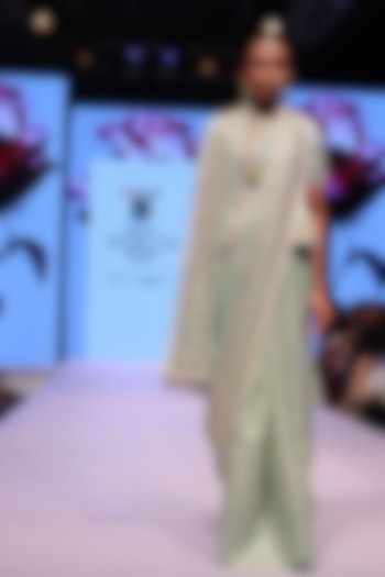 Teal gota patti embroidered pelum jacket and saree set available only at Pernia's Pop Up Shop.