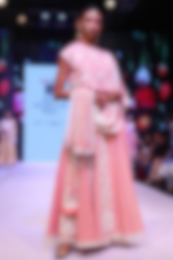 Salmon thread embroidered crop top and skirt set available only at Pernia's Pop Up Shop.