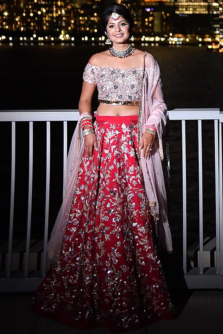 Pink and red embroidered lehenga set available only at Pernia's Pop Up Shop.