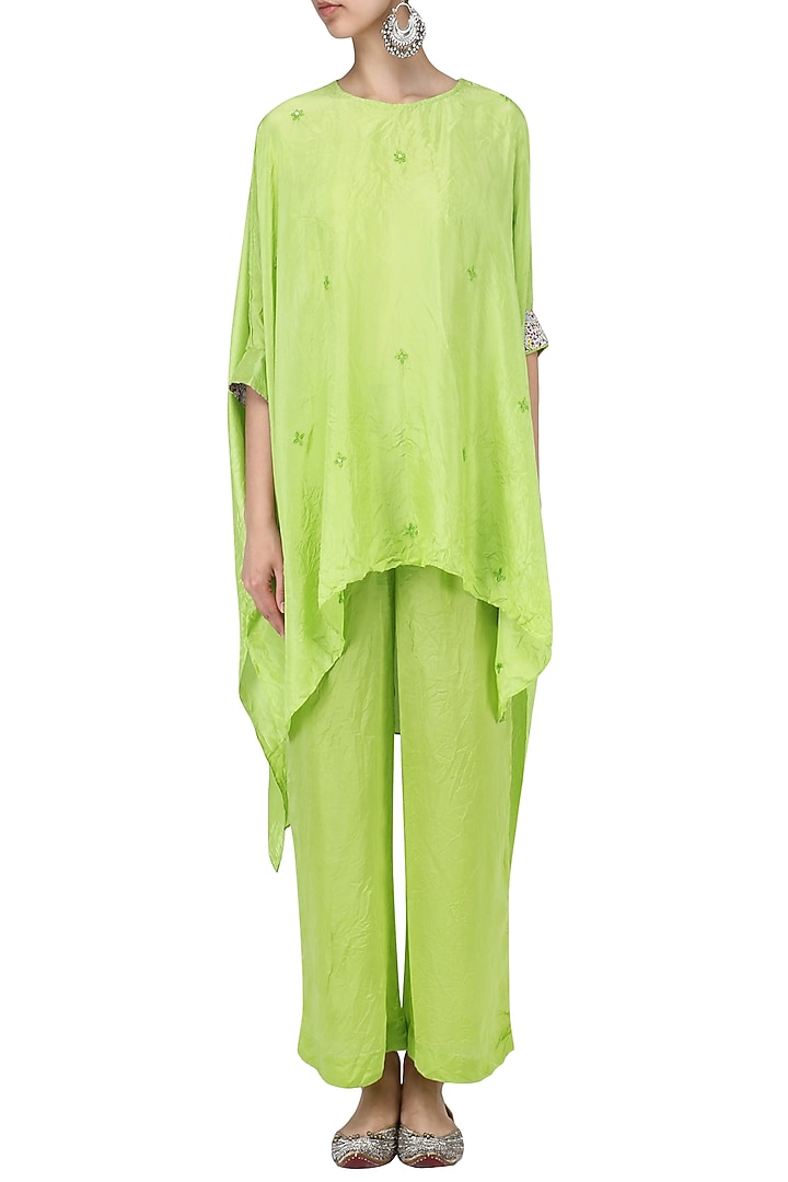 Fresh green embellished asymmetric top with pants available only at Pernia's Pop Up Shop.