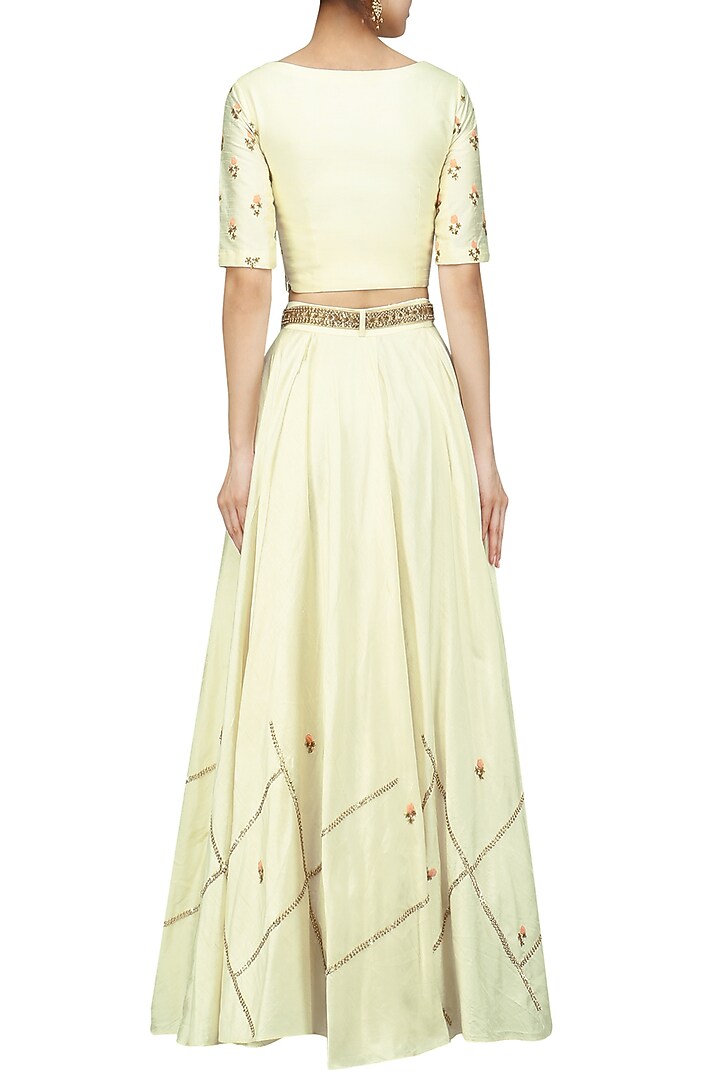 Offwhite embroidered crop top and skirt set available only at Pernia's Pop Up Shop.
