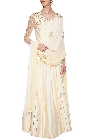 Off white and yellow embroidered anarkali set by Shikha and Nitika