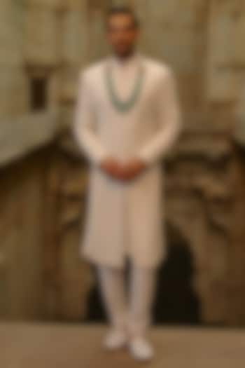 Ivory Raw Silk Dabka Embroidered Groom Sherwani Set by NITIKA GUJRAL MEN at Pernia's Pop Up Shop