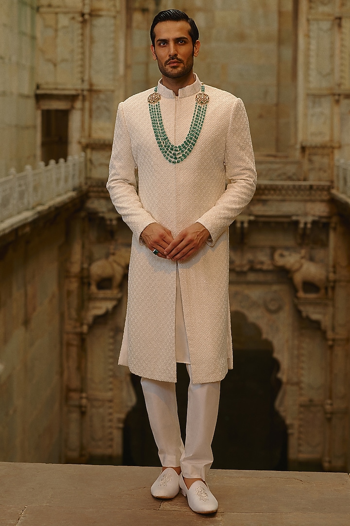 Ivory Raw Silk Dabka Embroidered Groom Sherwani Set by NITIKA GUJRAL MEN at Pernia's Pop Up Shop