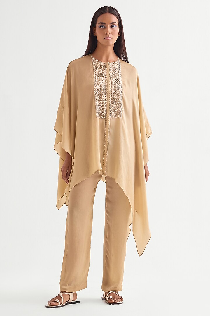 Beige Satin Asymmetrical Co-Ord Set by Namrata Joshipura at Pernia's Pop Up Shop