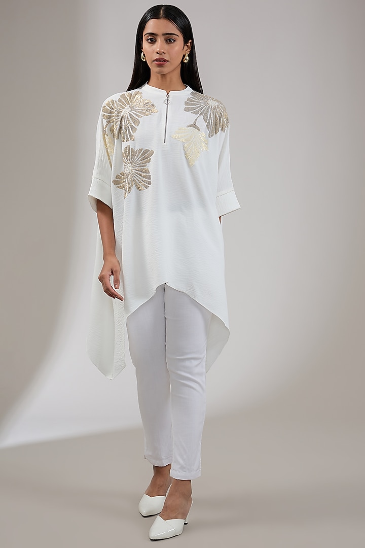 Ivory Textured Crepe Floral Hand & Machine Embellished Asymmetric Tunic by Namrata Joshipura at Pernia's Pop Up Shop