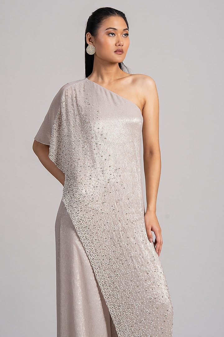 Ivory Shimmer Chiffon One-Shoulder Jumpsuit by Namrata Joshipura at Pernia's Pop Up Shop