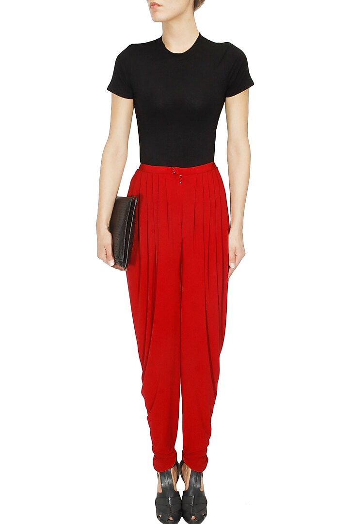 Red pleated jersey dhoti pants available only at Pernia's Pop Up Shop.