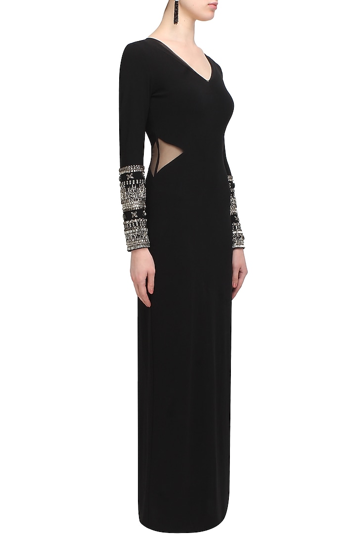 Black bedazzle sleeve dress available only at Pernia's Pop Up Shop.