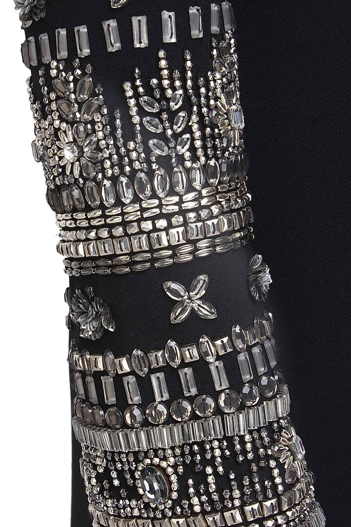 Black bedazzle sleeve dress available only at Pernia's Pop Up Shop.