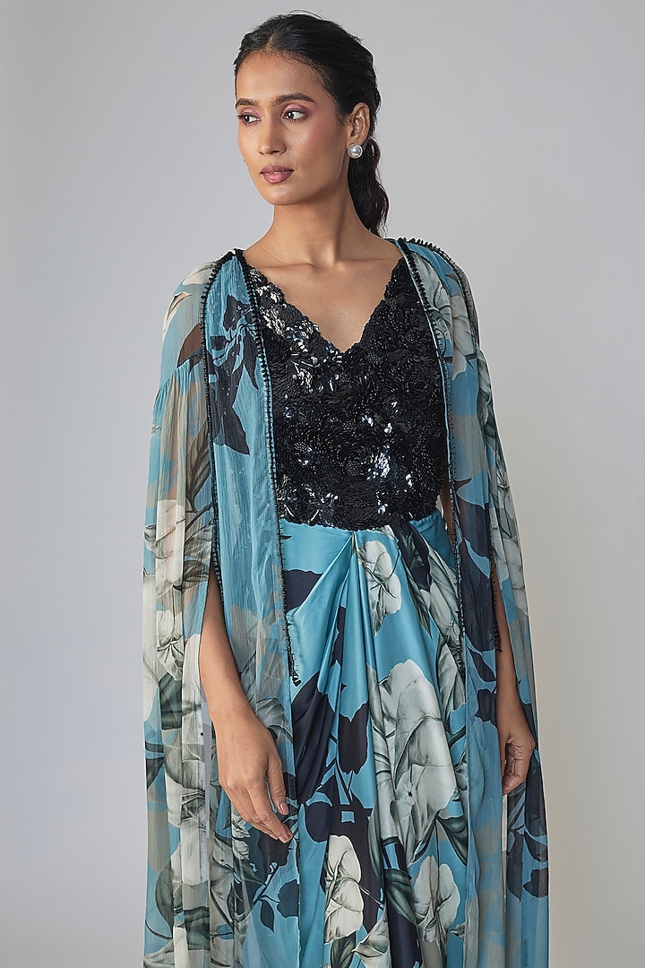 Sky Blue & Black Satin Printed Party Wear Dress With Cape by Nupur Kanoi at Pernia's Pop Up Shop