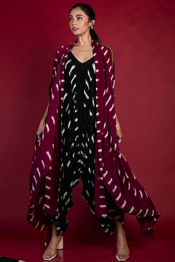 Burgundy Crepe Strappy Jumpsuit With Tail Coat by Nupur Kanoi