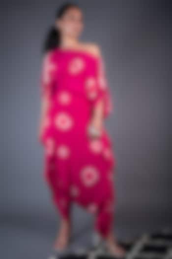 Rani Pink Printed Off-Shoulder Dhoti Jumpsuit by Nupur Kanoi