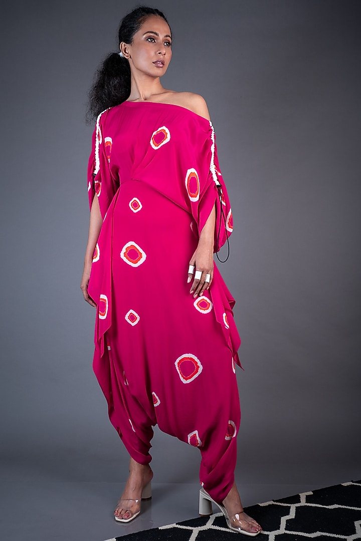 Rani Pink Printed Off-Shoulder Dhoti Jumpsuit by Nupur Kanoi