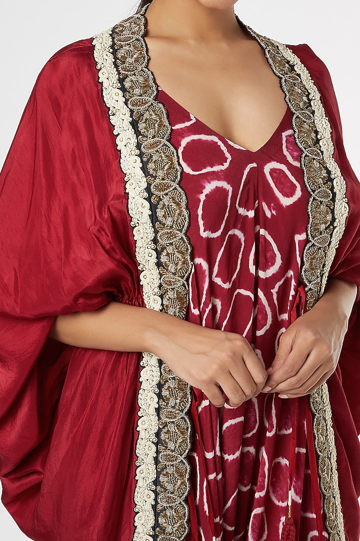 Burgundy Polka Dotted Strappy Jumpsuit With Cape by Nupur Kanoi at Pernia's Pop Up Shop
