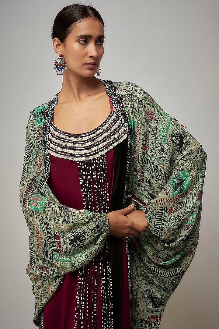 Burgundy Satin Maxi Party Wear Dress With Cape by Nupur Kanoi at Pernia's Pop Up Shop