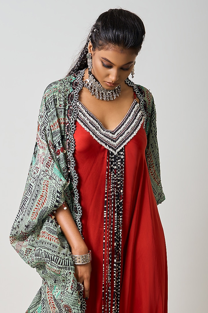 Rust Orange Crepe & Satin Embroidered Draped Jumpsuit With Cape by Nupur Kanoi at Pernia's Pop Up Shop