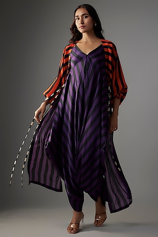 Purple Satin Stripes Printed Jumpsuit With Cape by Nupur Kanoi