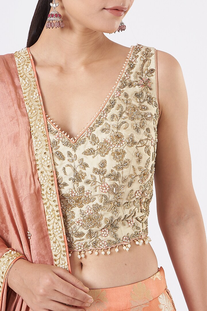 Peach Brocade Embroidered Wedding Lehenga Set by NITIKA GUJRAL at Pernia's Pop Up Shop
