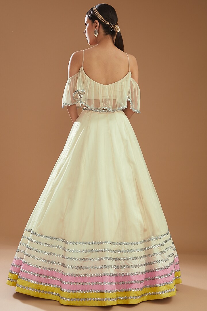 Ivory Raw Silk & Net Wedding Lehenga Set by NITIKA GUJRAL at Pernia's Pop Up Shop