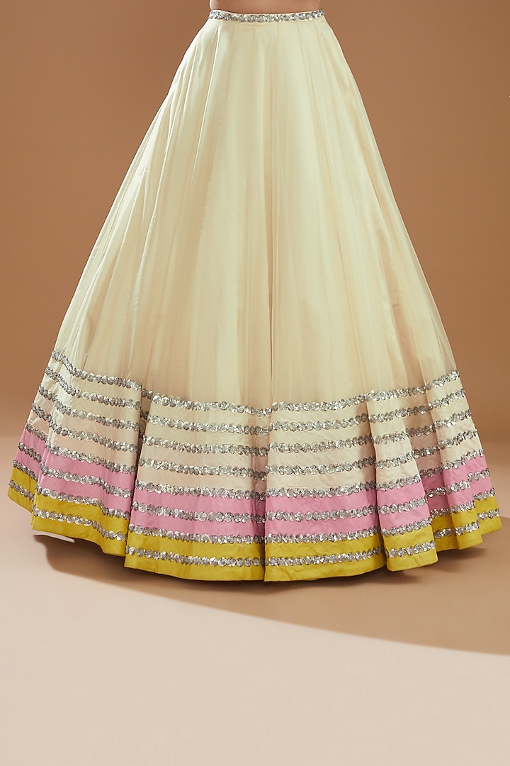 Ivory Raw Silk & Net Wedding Lehenga Set by NITIKA GUJRAL at Pernia's Pop Up Shop